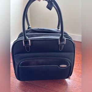 Black Samsonite one nighter travel bag